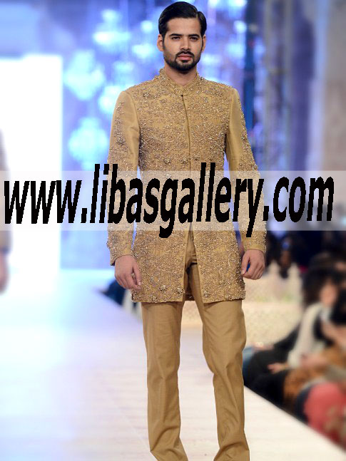 famous pakistani brand hsy presents golden wedding sherwani with gold and silver hand embellishment all over front cyprus usa dubai
